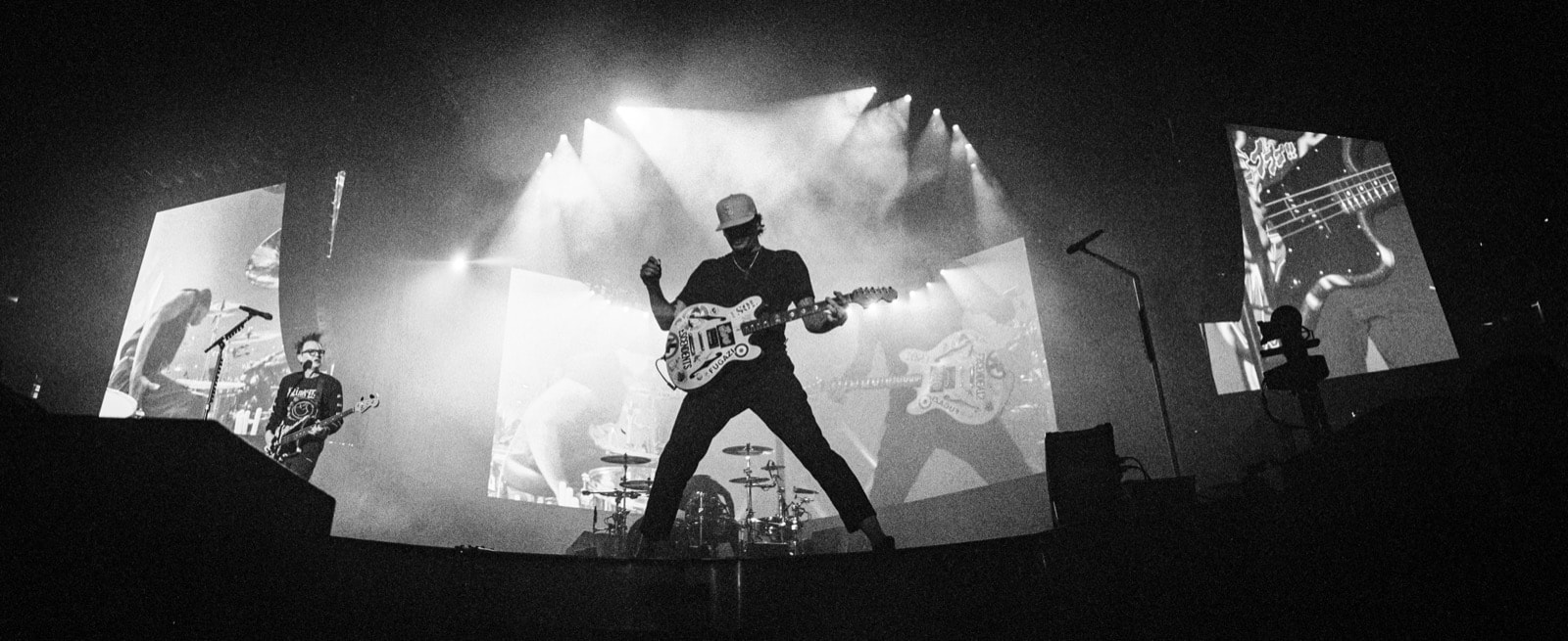 Blink 182 on stage. Photo taken by Peter McKinnon on the Widelux