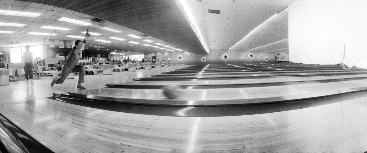 Widelux Photo showing a man bowling.